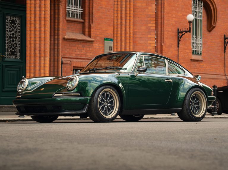 The widened stance and low ground clearance signal the immense potential lurking beneath the refined bodywork.