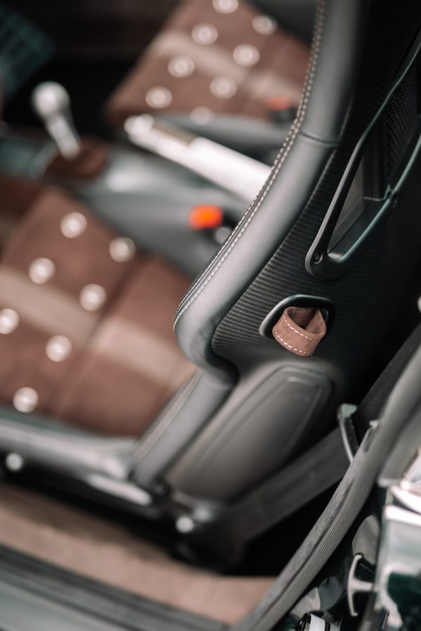 RCR Porsche 911 restomod in side profile highlighting classic silhouette and modern stance